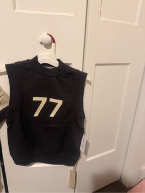 Essentials Black Sleeveless Kids Top with Cream '77' Graphic